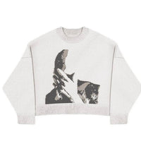 KNITTED SWEATERS